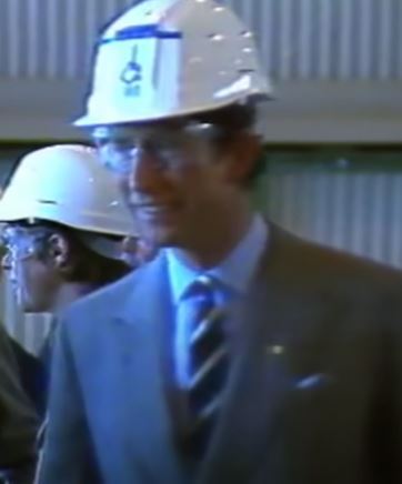 Charles then cheekily asked staff members if their wives laughed at their hats